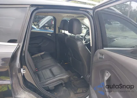 2014 Ford Escape Titanium z USA, uszkodzony, nr VIN 1FMCU9J92EUD19320